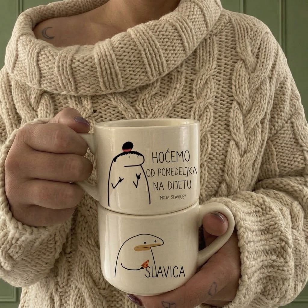 Dve krem šolje u rukama, natpisi Hoćemo od ponedeljka na dijetu moja Slavice i Slavica sa crtežom lika